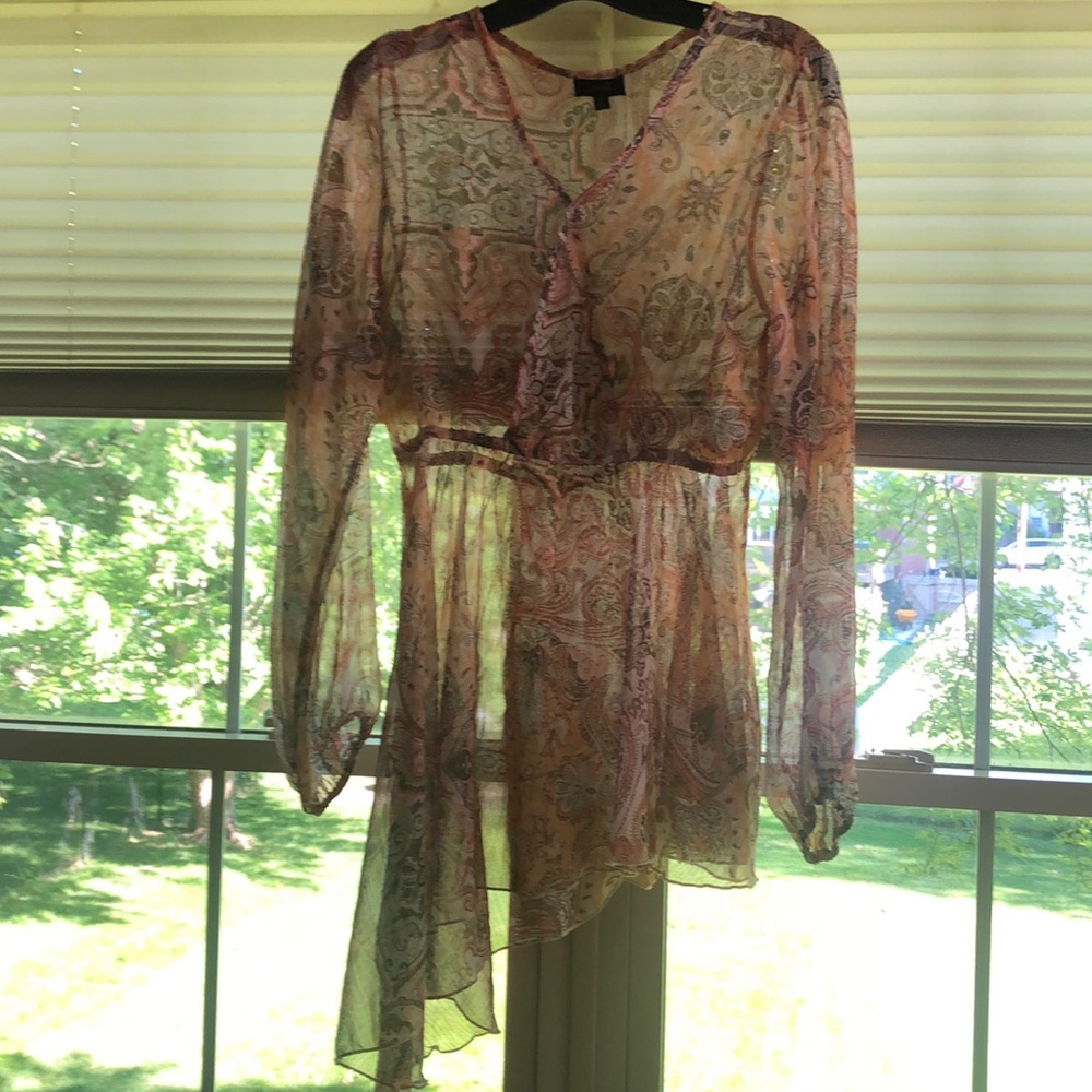 Asymmetrical print blouse. NWOT